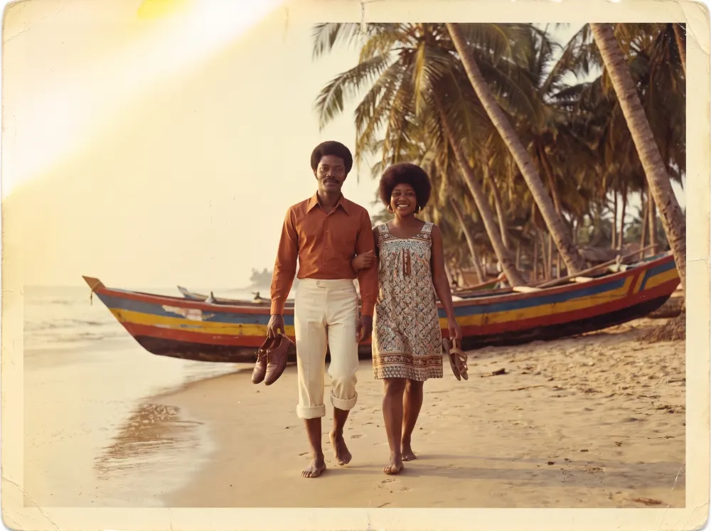 A faded seaside snapshot: the two of them walking barefoot up the beach past a striped fishing canoe.